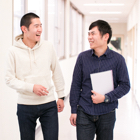 Photo: Students walking along a corridor