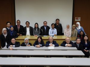 With speakers, after the symposium