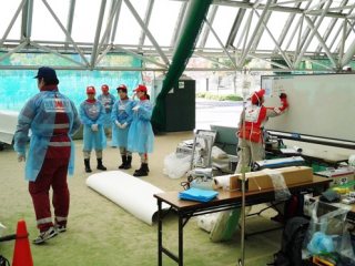 スクリーニングの検証訓練の様子 写真:スクリーニングの検証訓練の様子